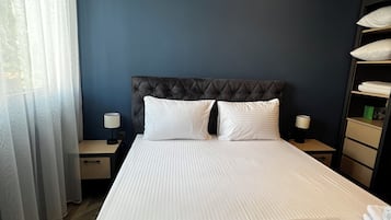 Appartement Deluxe, 1 grand lit et 1 canapé-lit, non-fumeurs, vue ville | Bureau, espace de travail pour ordinateur portable, rideaux occultants
