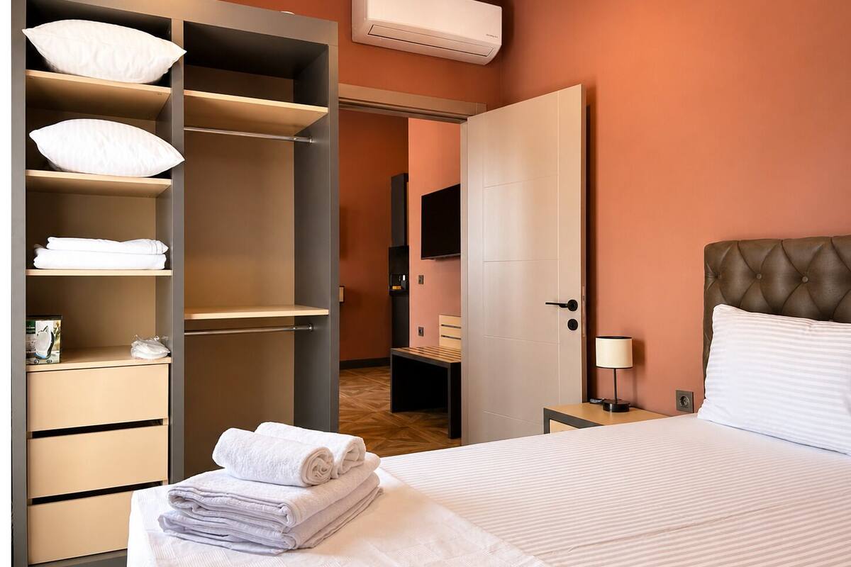 Deluxe Penthouse, 1 Queen Bed with Sofa bed, Non Smoking, City View | Desk, laptop workspace, blackout drapes, iron/ironing board