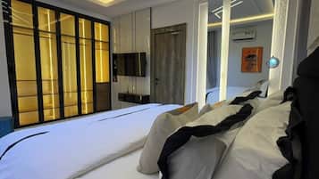 Economy Room, Balcony, City View | Desk, laptop workspace, blackout drapes, soundproofing