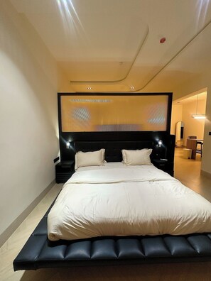 Economy Room, Balcony, City View | Desk, laptop workspace, blackout drapes, soundproofing