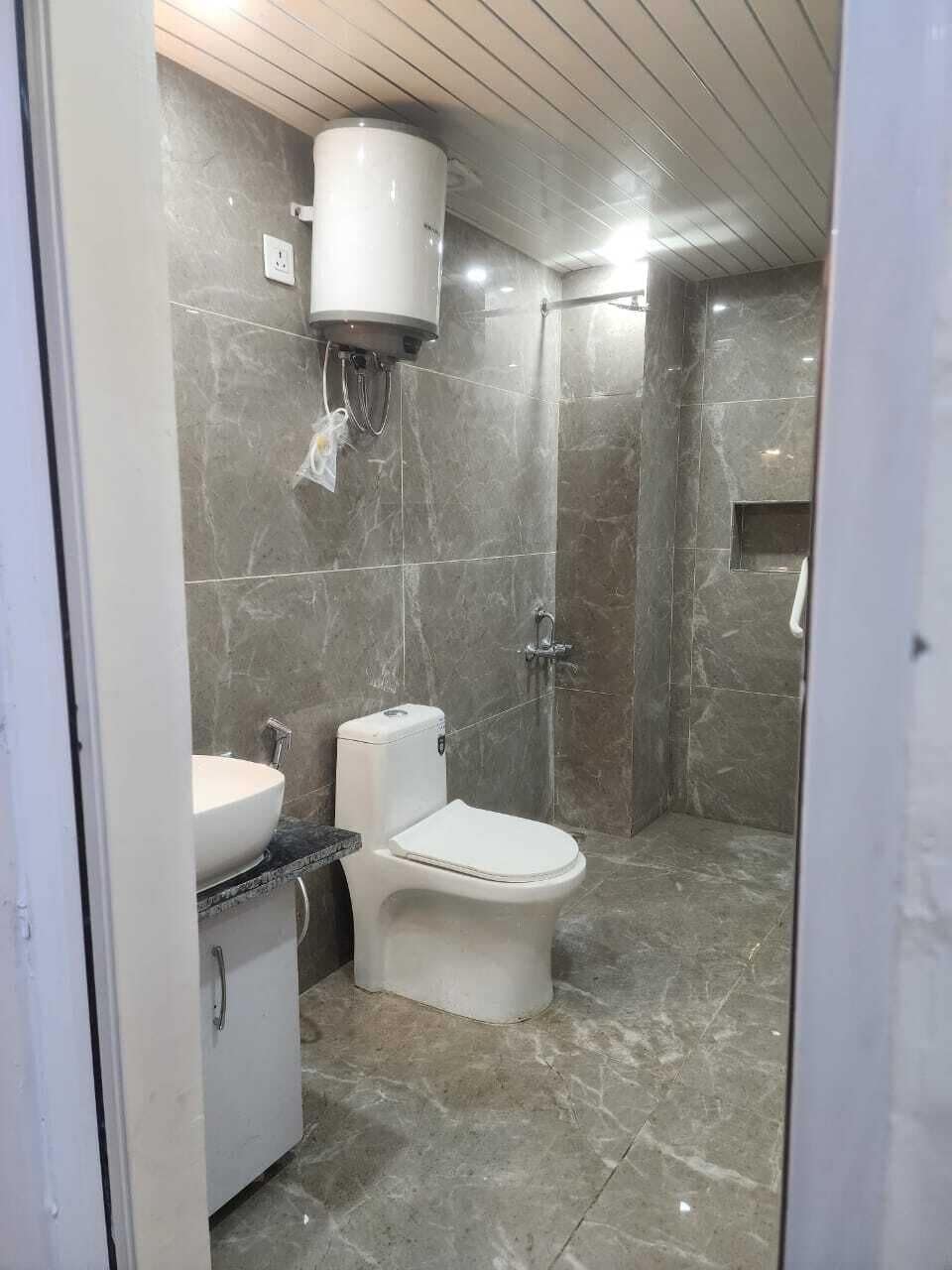 Shower, towels, soap, toilet paper
