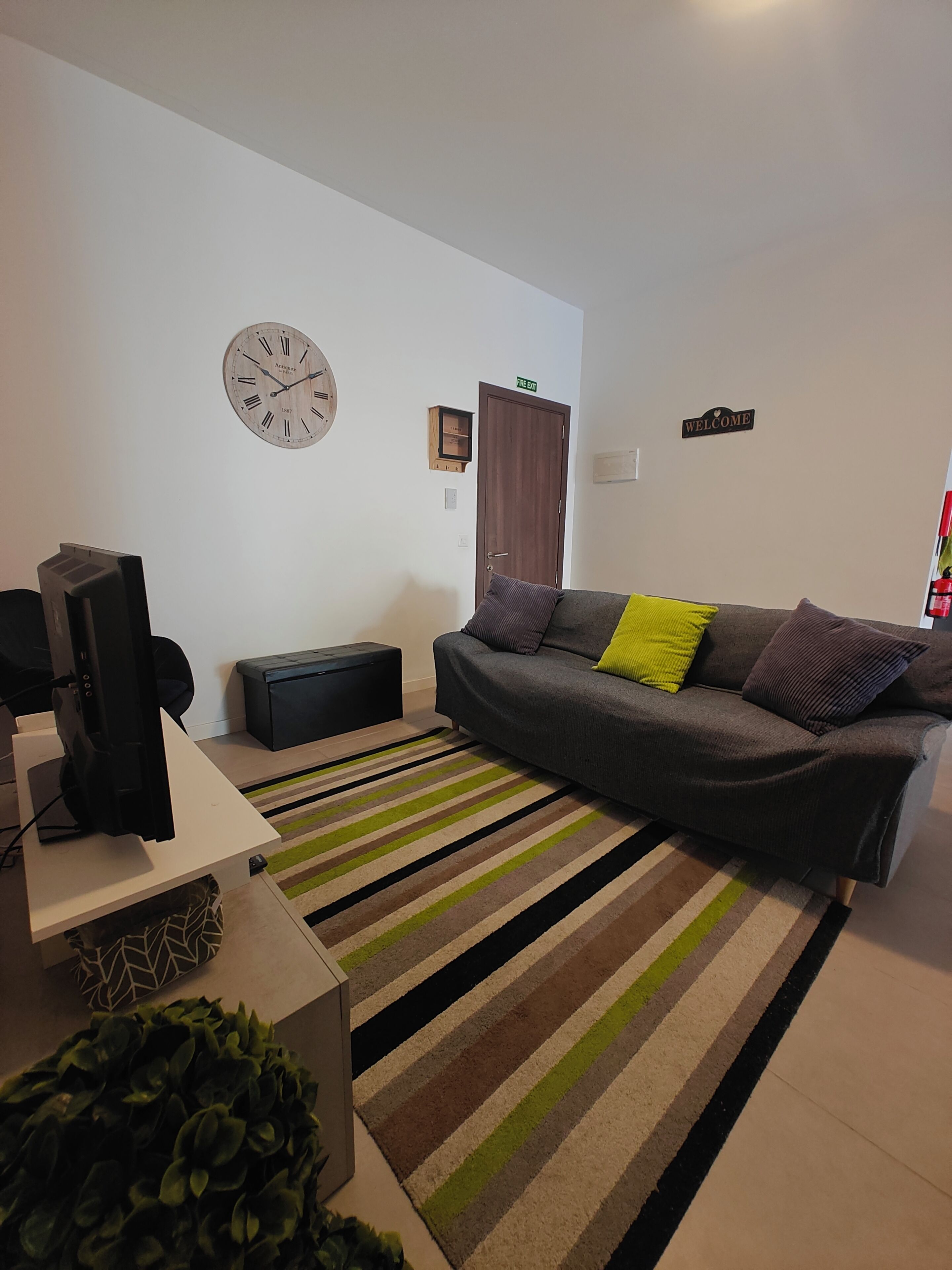 Departamento, 2 habitaciones, vista a la ciudad | Área de sala de estar