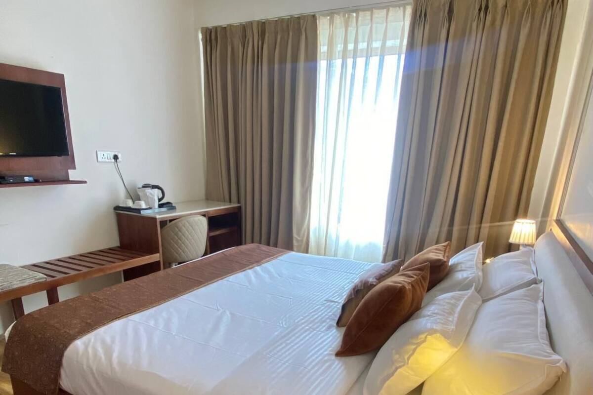 ห้องดีลักซ์ดับเบิล, วิวภูเขา | โต๊ะทำงาน, พื้นที่ทำงานแบบใช้แล็ปท็อป, Wi-Fi ฟรี