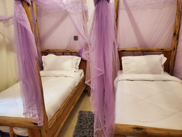 Comfort Triple Room, Balcony | Laptop workspace, blackout drapes, soundproofing, free WiFi - ESE HOMESTAY MANYARA (Lake Manyara National Park)