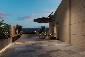 Premium kamer, balkon, uitzicht op de stad | Terras