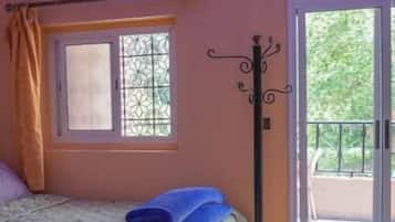 Deluxe Quadruple Room, Balcony | Free WiFi