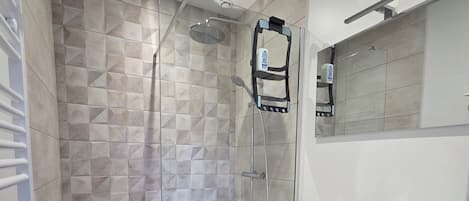 Shower, hair dryer, towels, soap