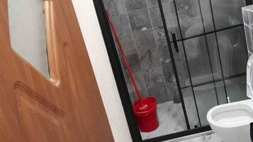 Family Apartment, Garden View | Bathroom | Shower, hair dryer, towels, soap