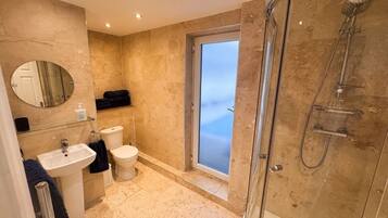 Hair dryer, towels, soap, toilet paper