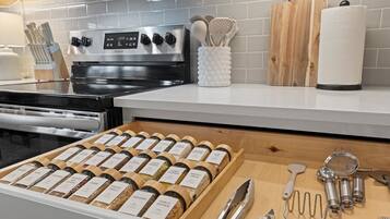 Coffee/tea maker, fridge, microwave, oven