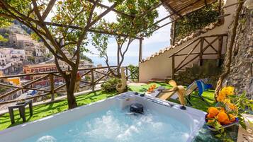 Deluxe Apartment, Sea View | Outdoor spa tub