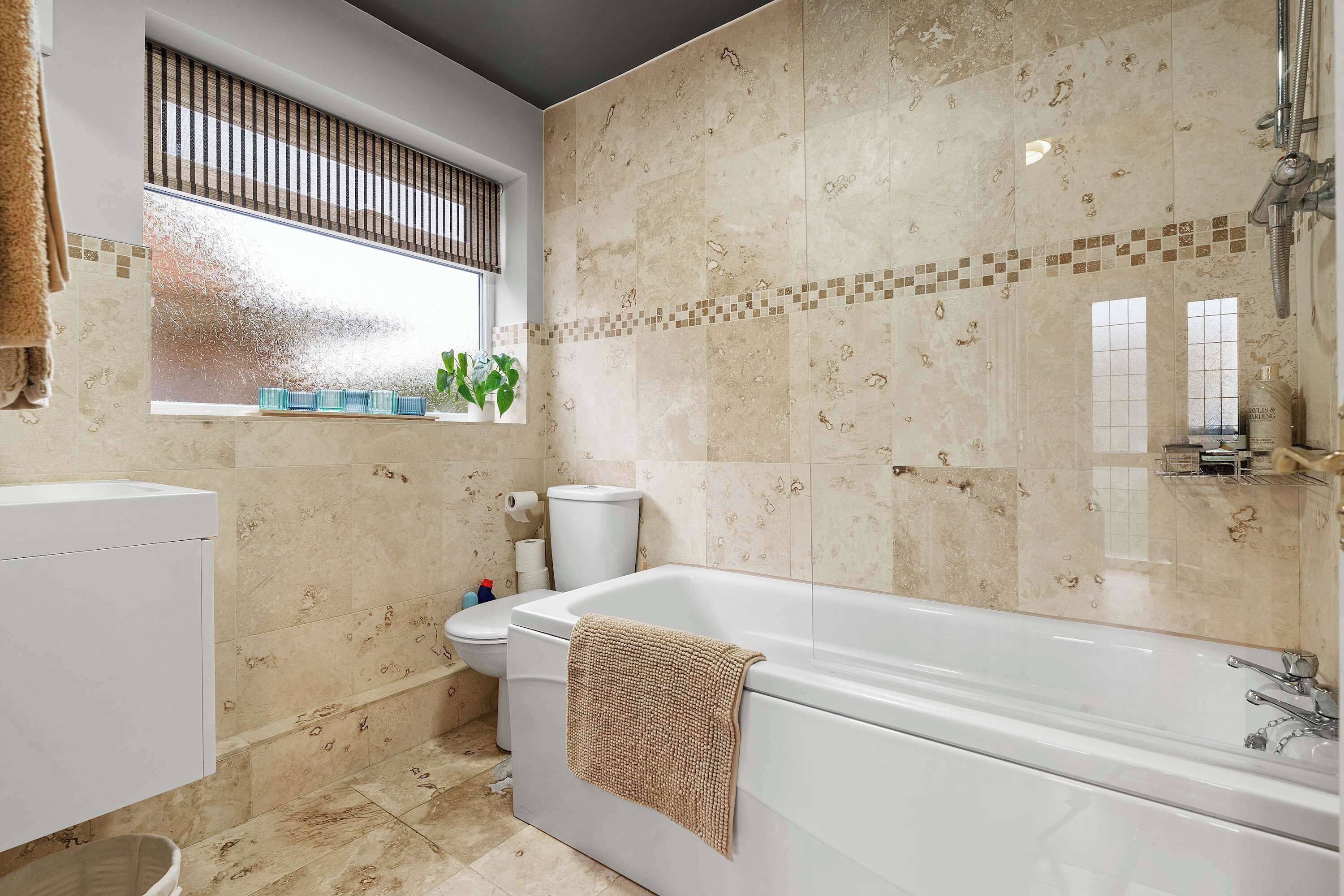 Shower, hair dryer, towels, shampoo