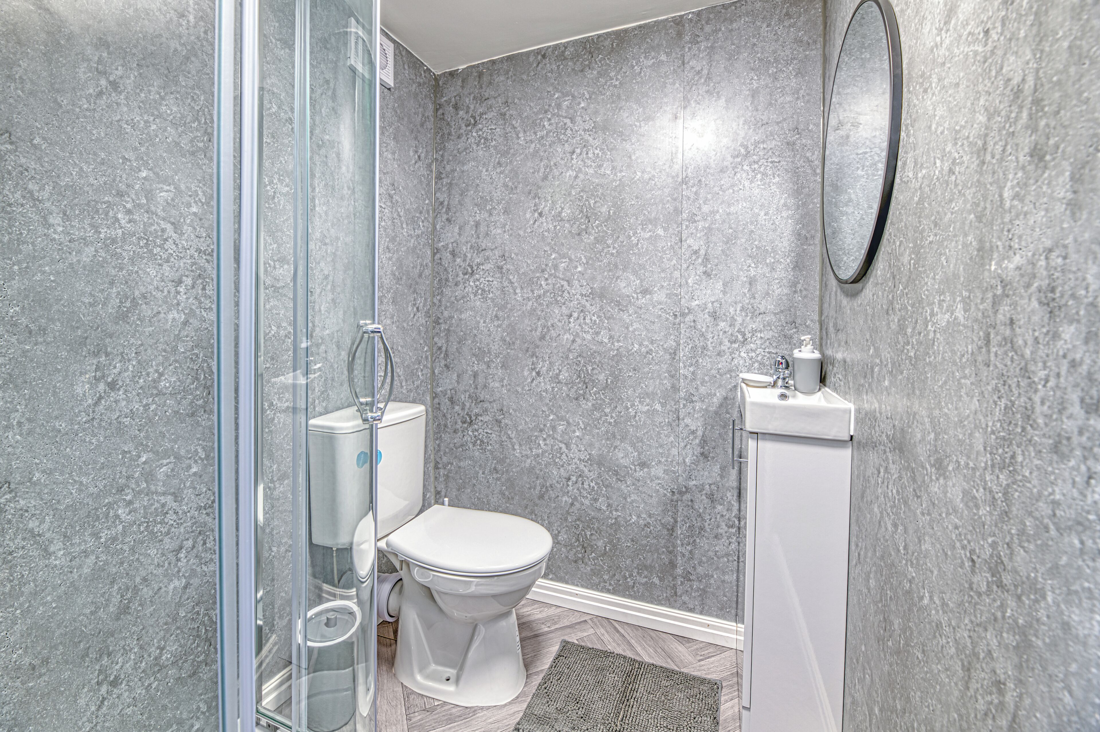 Shower, towels, toilet paper