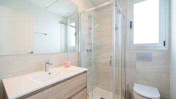Shower, hair dryer, towels, soap