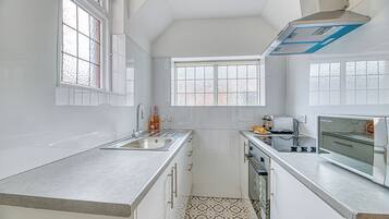 Fridge, microwave, electric kettle, toaster