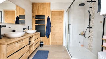 Shower, hair dryer, towels, soap