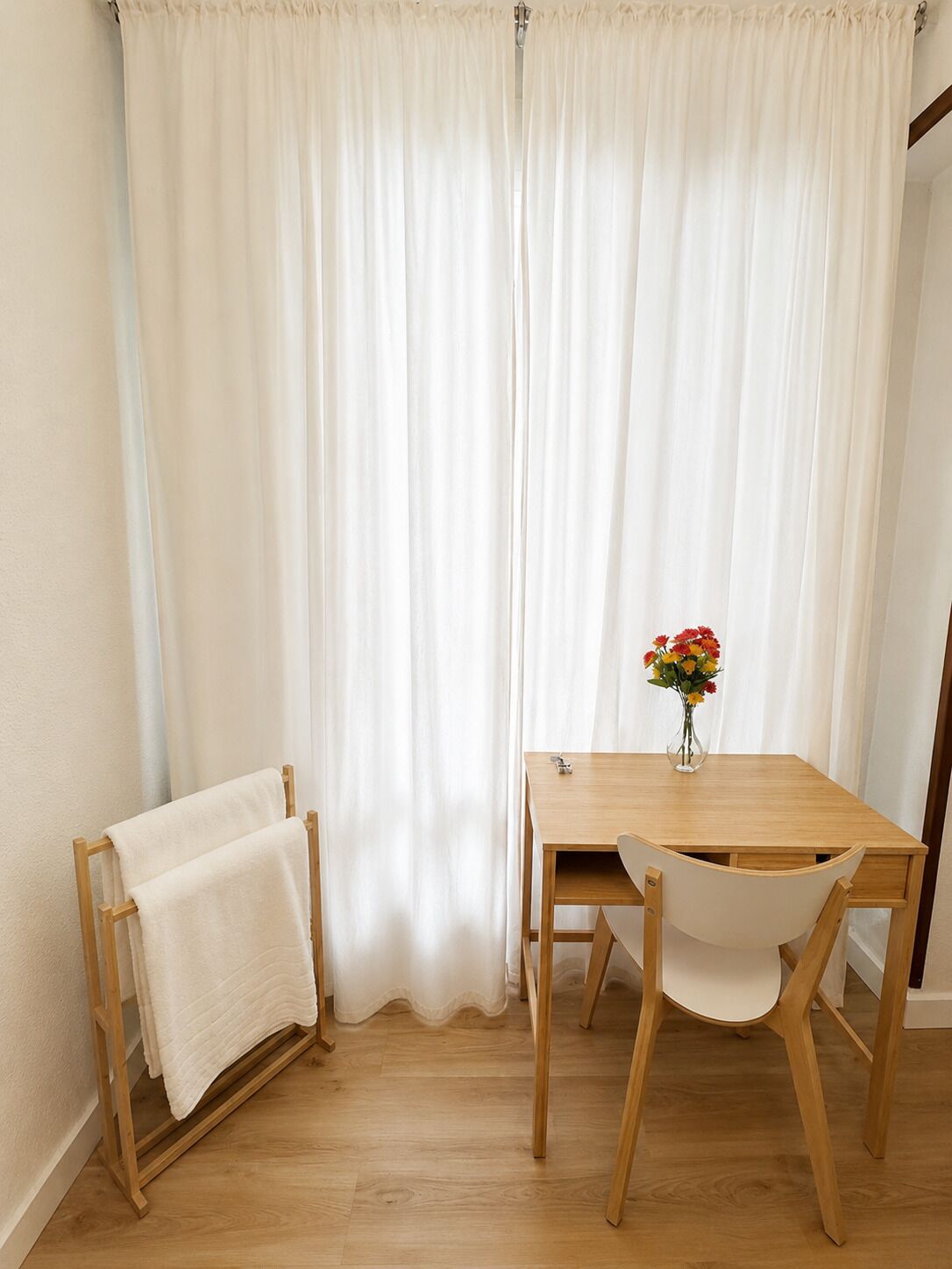 Premium bedding, down comforters, desk, laptop workspace