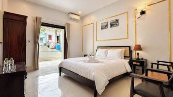 Economy Double Room, City View | Desk, laptop workspace, blackout drapes, soundproofing