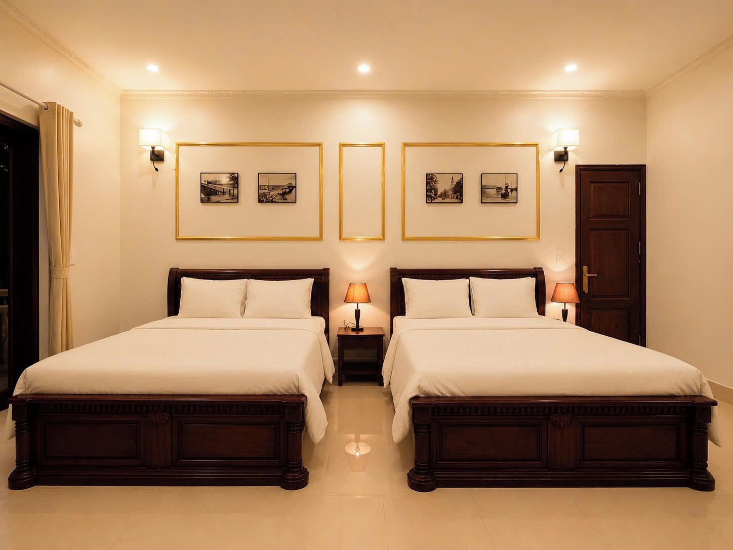 A hotel room with two beds, a wardrobe, and two wall-mounted lamps.