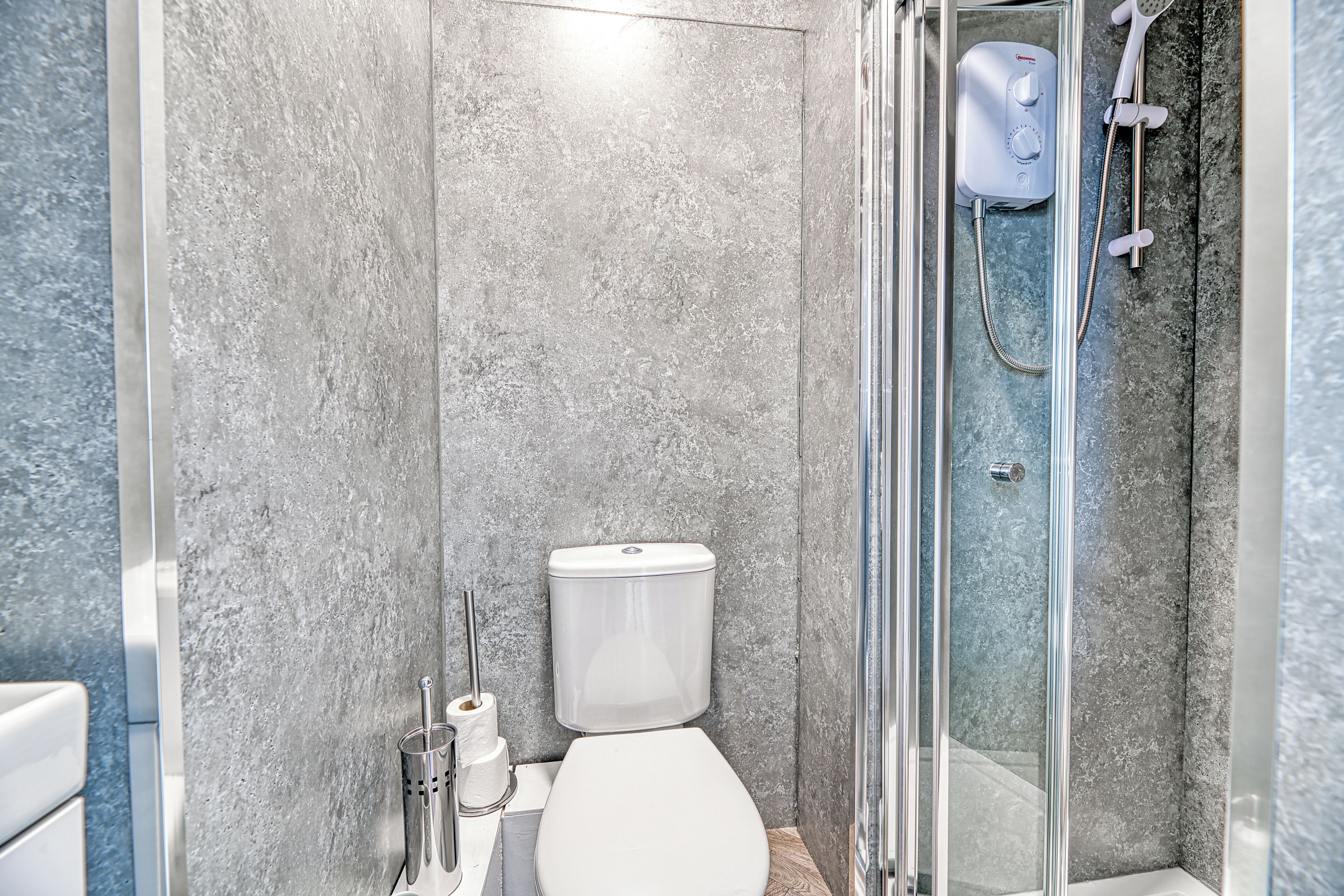 Shower, towels, toilet paper