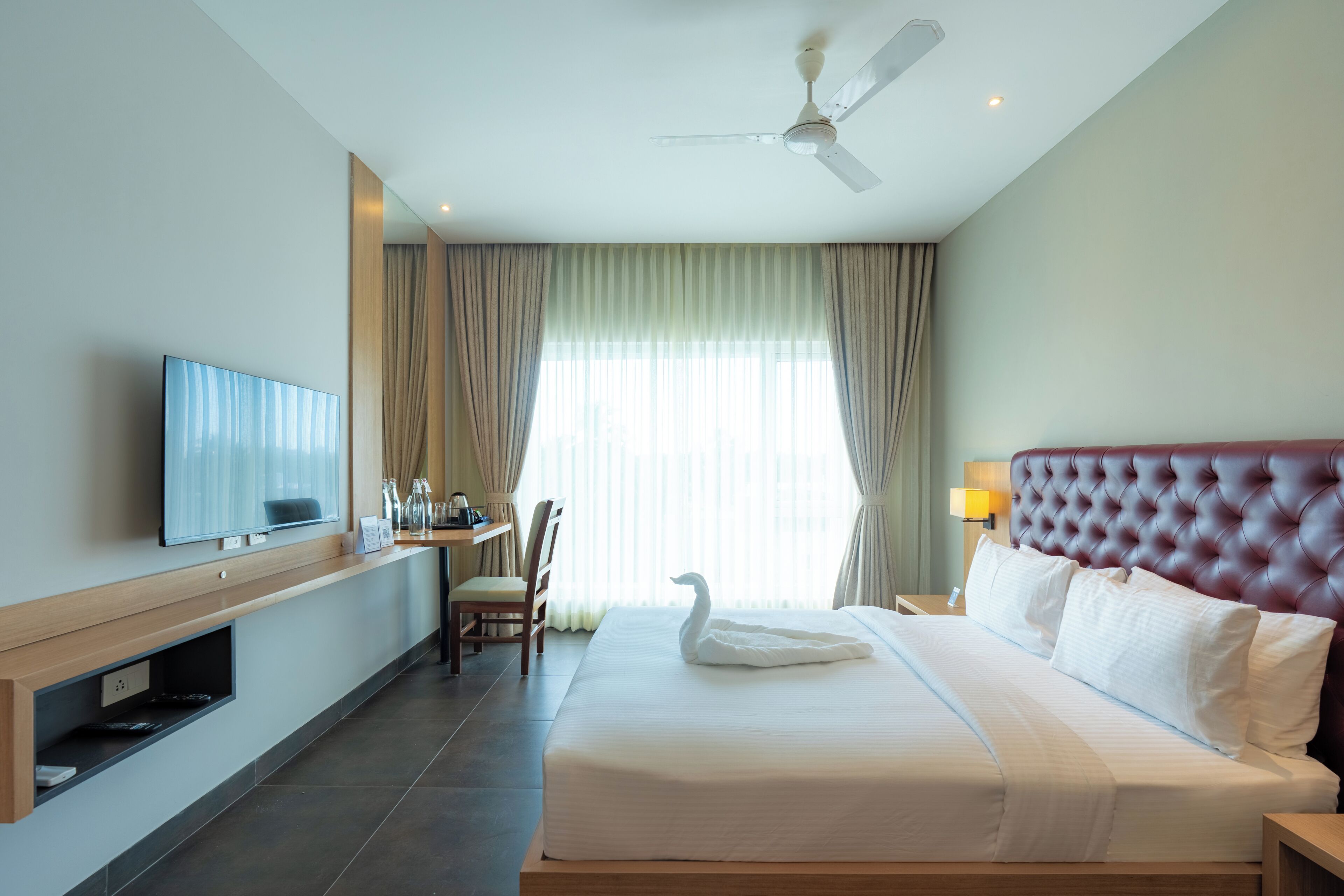 Deluxe Double Room, City View | Desk, laptop workspace, iron/ironing board, free WiFi