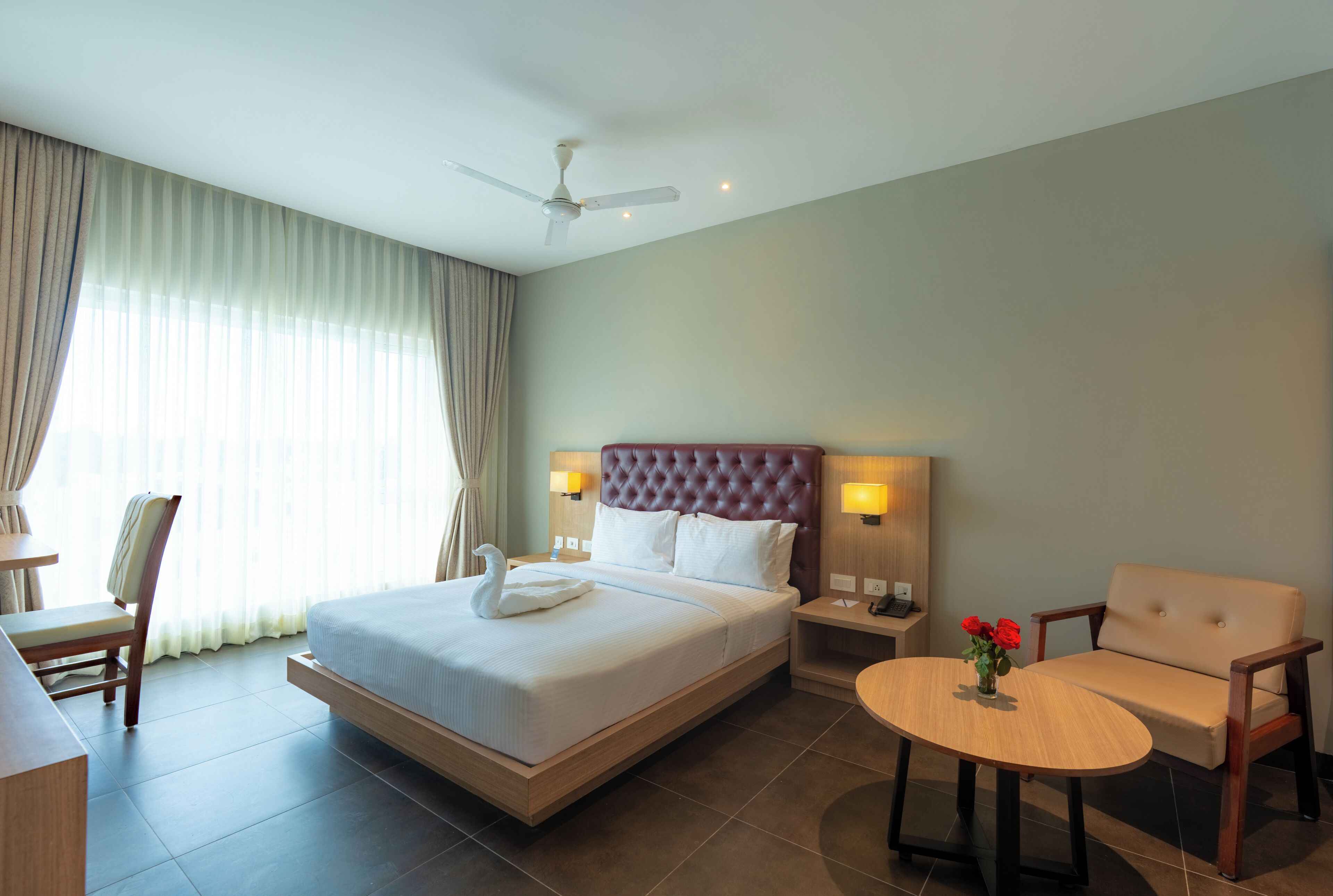 Deluxe Room, City View | Desk, laptop workspace, iron/ironing board, free WiFi