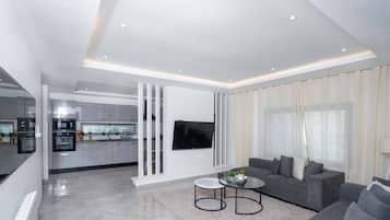 Appartement Deluxe, vue ville | Coin séjour