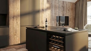 A modern kitchen with a wine rack, a wine bottle, and glasses on the counter. - Ladis Suites by ALPS RESORTS (Ladis)