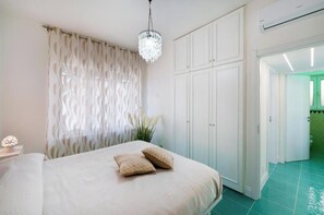 2 slaapkamers, een strijkplank/strijkijzer, wifi, beddengoed