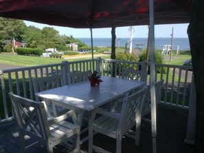 Outdoor dining - Cozy WATERFRONT Steps to Beach 2 bedroom cottage in serene Hampton Bays with AC (Hampton Bays)