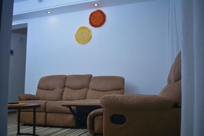 Apartament Deluxe, vistes a la ciutat | Sala d'estar