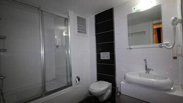 Basic Double Room, Balcony, City View | Bathroom | Shower, hair dryer, towels, soap
