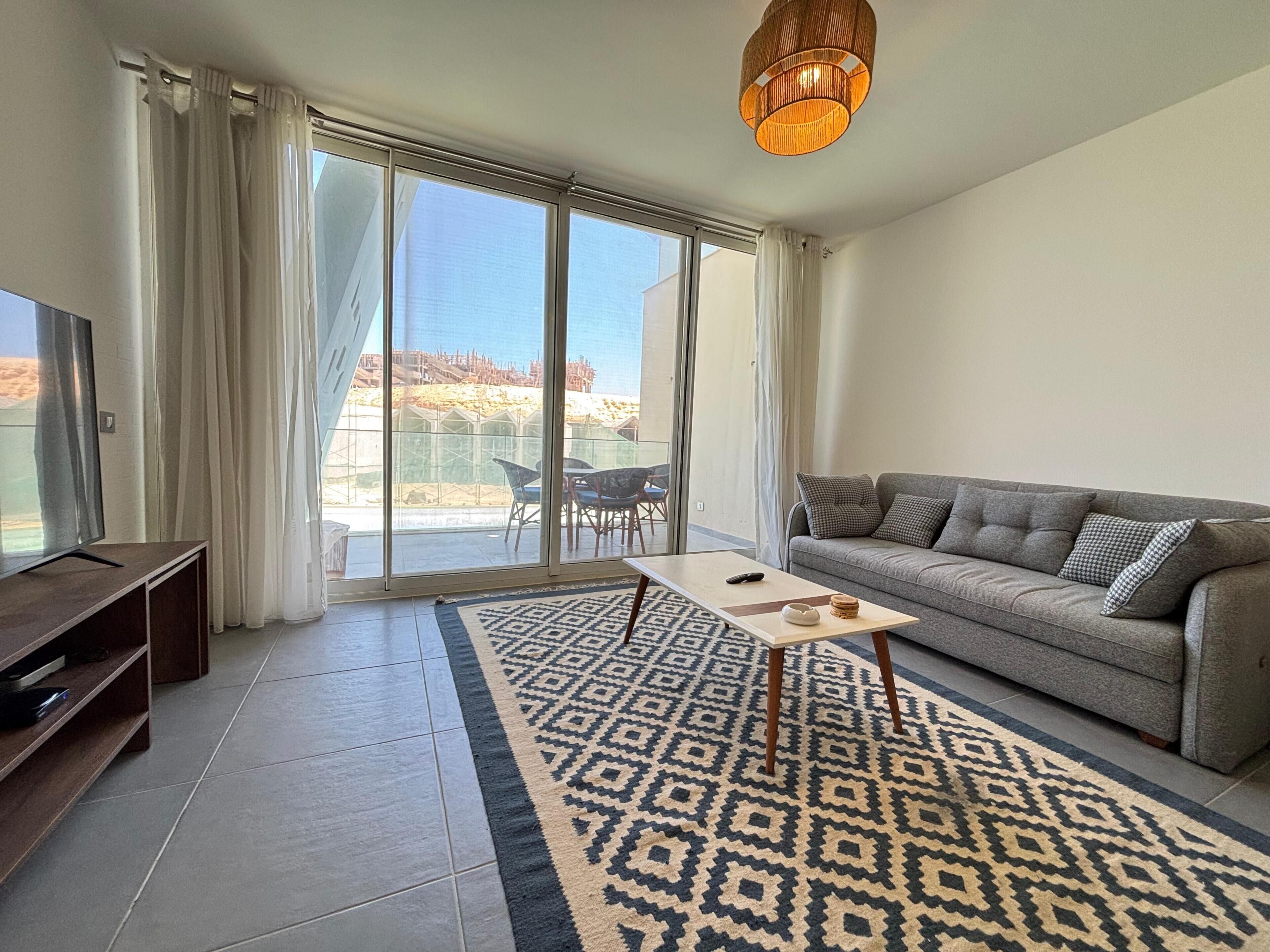 Chalet, 3 Bedrooms, Lagoon View | Living area | Flat-screen TV