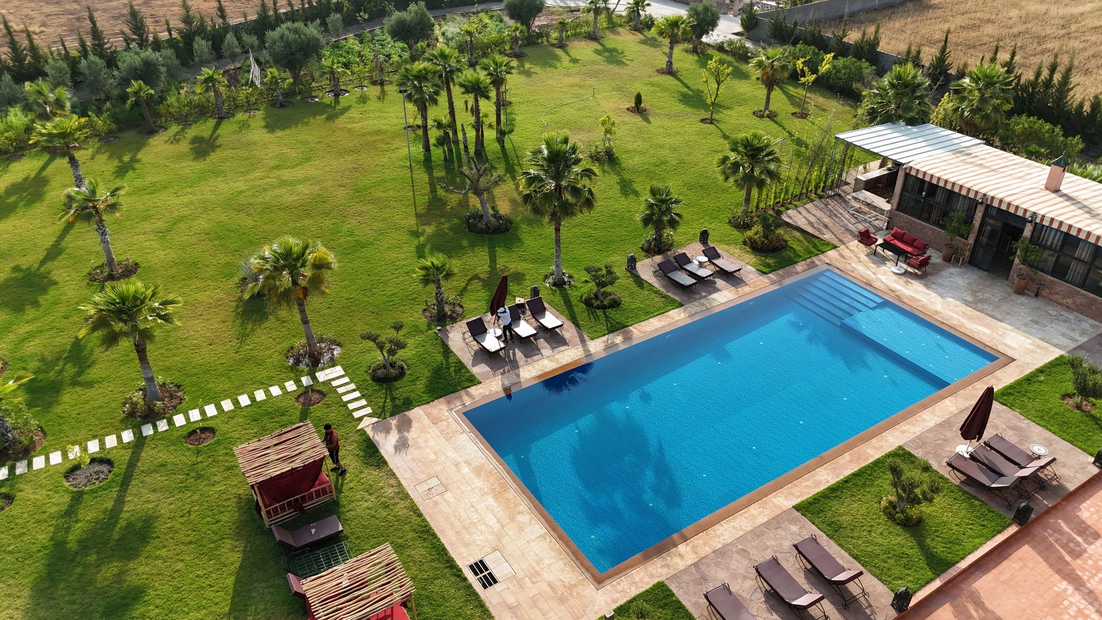 Outdoor pool, free pool cabanas, pool umbrellas