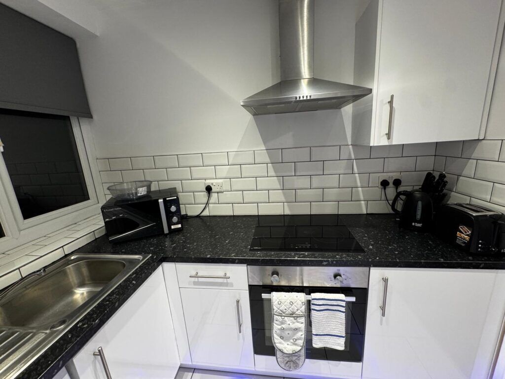 Signature Apartment, City View | Private kitchen | Mini-fridge, stovetop, cookware/dishes/utensils