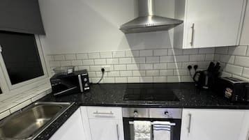 Signature Apartment, City View | Private kitchen | Mini-fridge, stovetop, cookware/dishes/utensils