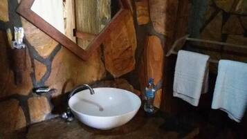 Deluxe Quadruple Room, Balcony, Ocean View | Bathroom | Shower, slippers, towels, soap