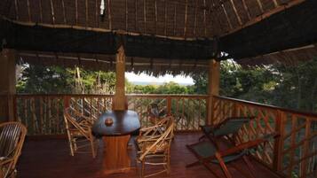 Deluxe Quadruple Room, Balcony, Ocean View | Outdoor dining