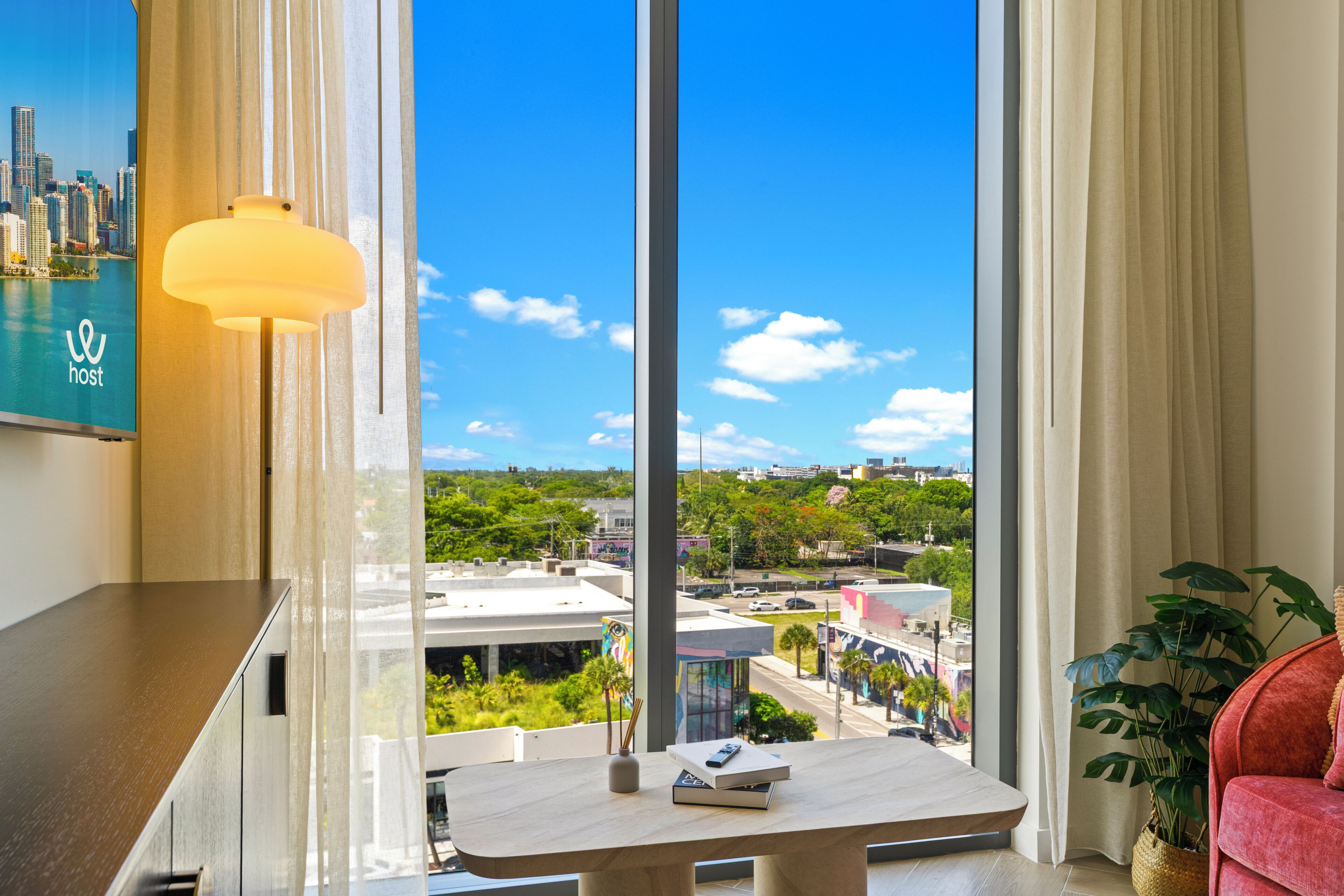 Apartment, 2 Bedrooms, City View | Living area | 50-inch Smart TV with cable channels
