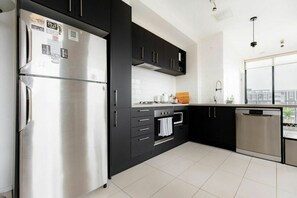 Fridge, microwave, oven, dishwasher - Stylish2BD Penthouse Panoramic Views Nth Melbourne (North Melbourne)