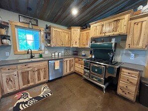 Private kitchen - Charming 3-bedroom farmhouse outside Harrisonville for relaxing stays (Peculiar)