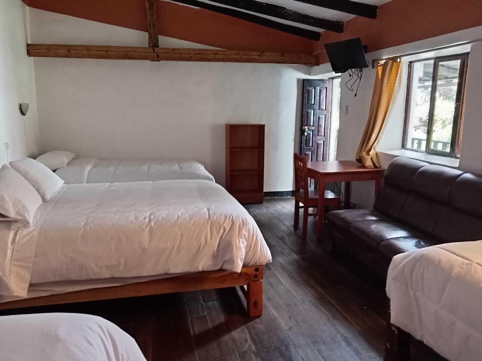 Habitación cuádruple familiar | Vista al jardín