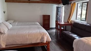 Habitación cuádruple familiar | Vista al jardín