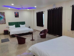 Luxury Studio Suite, Balcony, City View | In-room safe, desk, iron/ironing board, free WiFi