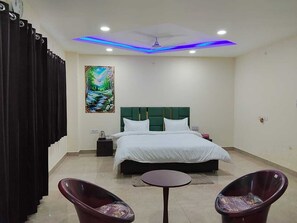 Luxury Studio Suite, Balcony, City View | In-room safe, desk, iron/ironing board, free WiFi