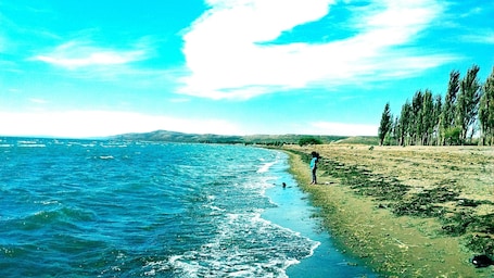 Beach. Mayim Lodging: Comfort and Relaxation in Sarmiento, Chubut, Argentina