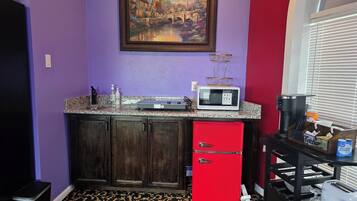 Fridge, microwave, stovetop, coffee/tea maker