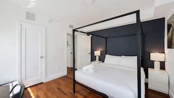 Desk, laptop workspace, blackout curtains, iron/ironing board