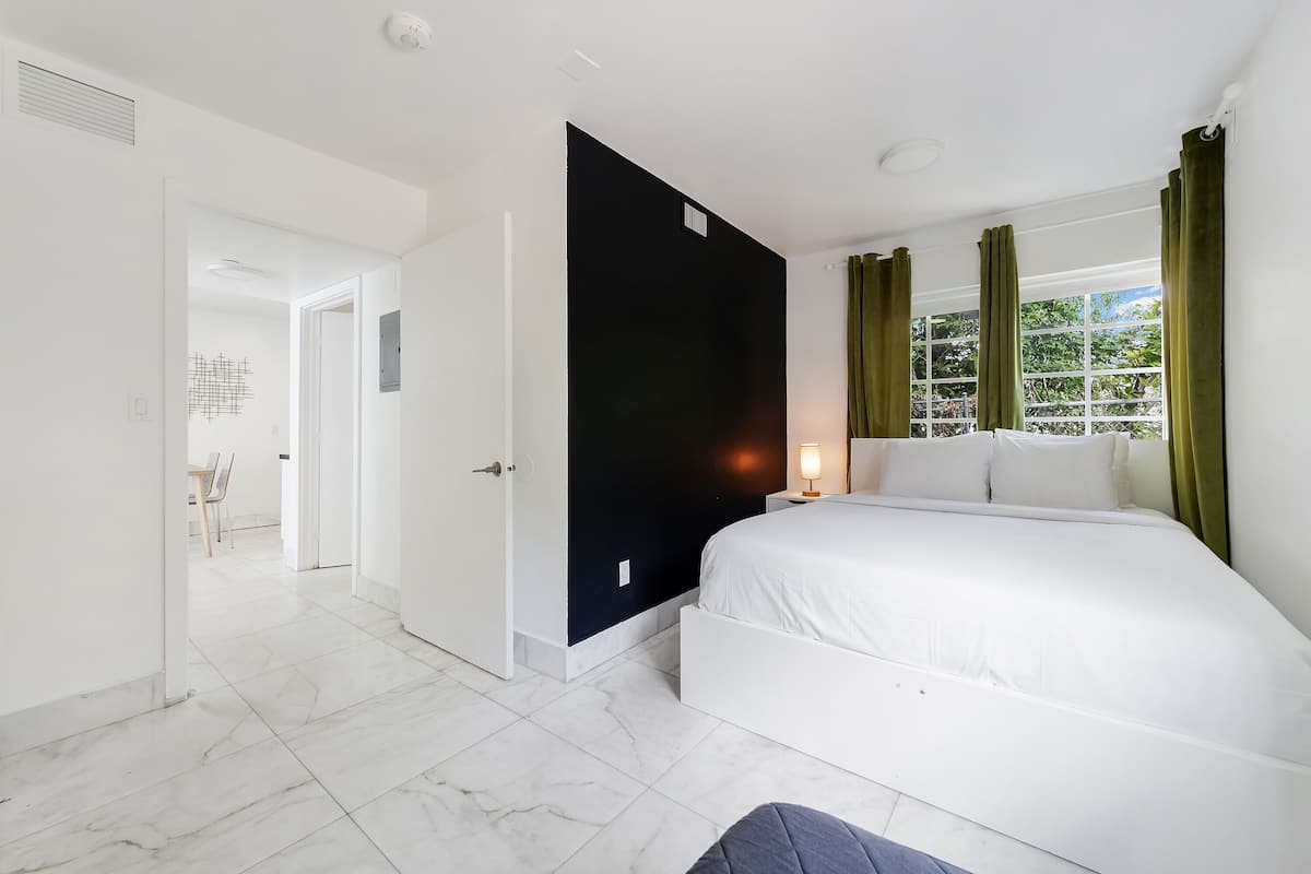 Apartment, 2 Bedrooms, Kitchenette | Desk, laptop workspace, iron/ironing board, free WiFi