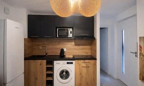 Private kitchen - Apartment 78, Résidence Les hameaux de Saint-Cyprien, 5 minutes from the beach. (Lecci)